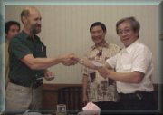 John receiving his Life Membership Card from Deric